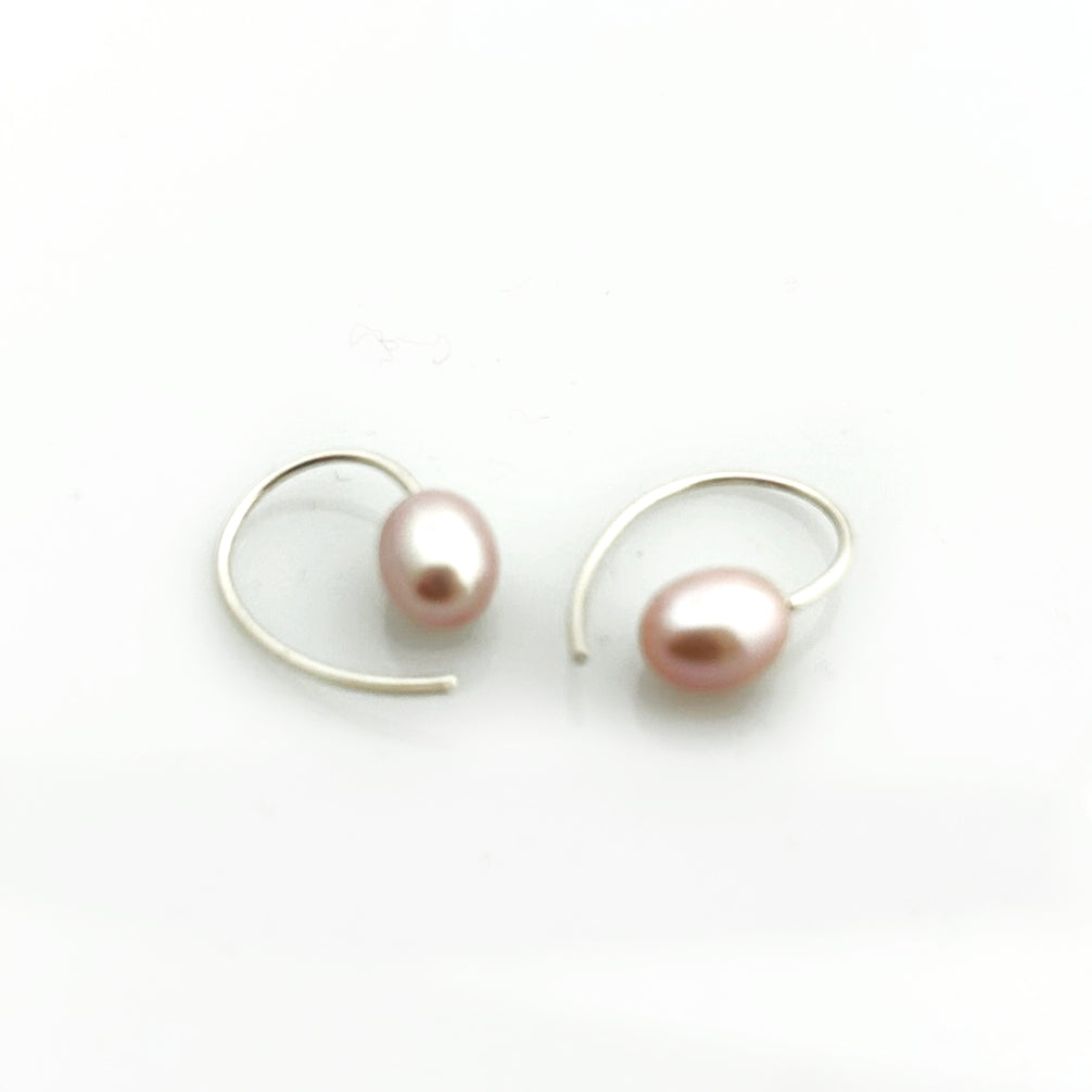 Delicate pink pearl earrings made of 925 Sterling silver